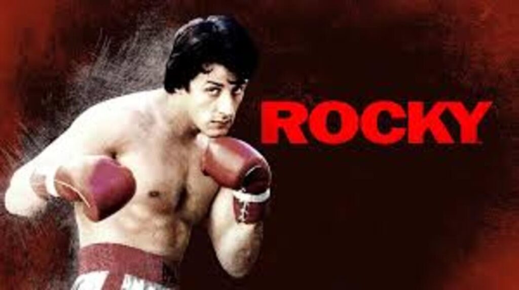 Palco, Luzes, Ação! 10 Filmes Que Viraram Musicais de Sucesso (e Roubaram a Cena) 5 Rocky