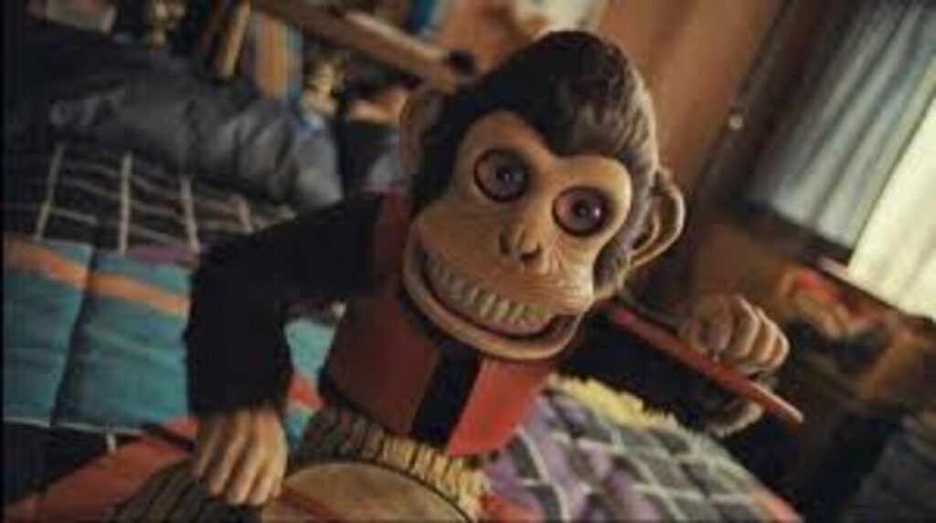 Cinema de Gênero: 10 Filmes de Horror Pós-Moderno que Redefiniram o Medo 6 O-Macaco