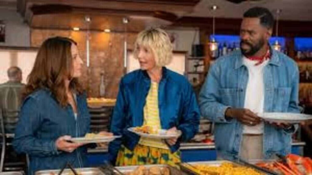 Personagens principais conversando em um buffet de restaurante em cena leve da segunda temporada da série As Quatro Estações do Ano. A imagem promocional focada na interação cotidiana do elenco e na excelente composição de cores em tons de azul é ideal para ilustrar críticas de episódios, análises de convivência e novidades de séries de drama no site.